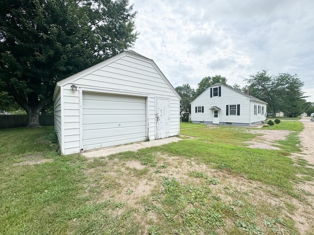 garage featuring a yard