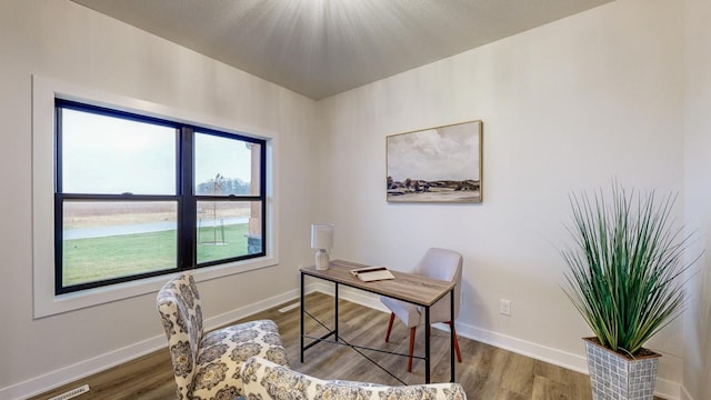 1701 20th Ave Circle NE, Kasson, MN 55944 - home office featuring baseboards and wood finished floors