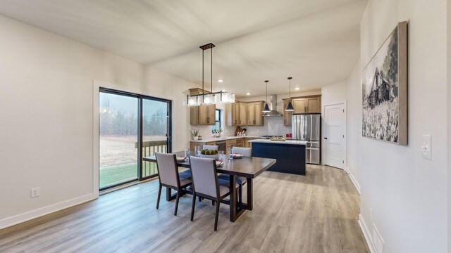 1701 20th Ave Circle NE, Kasson, MN 55944 - dining room with baseboards, light wood finished floors, and recessed lighting