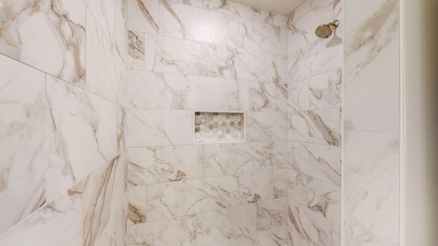 details featuring tiled shower