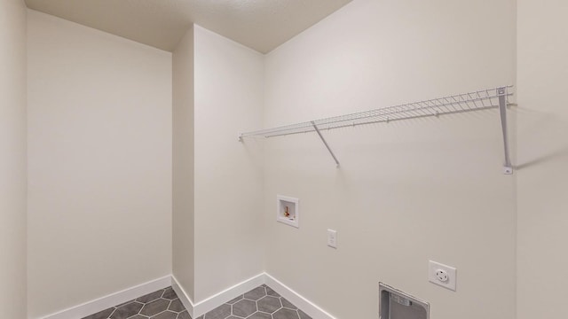 laundry area featuring hookup for an electric dryer and hookup for a washing machine