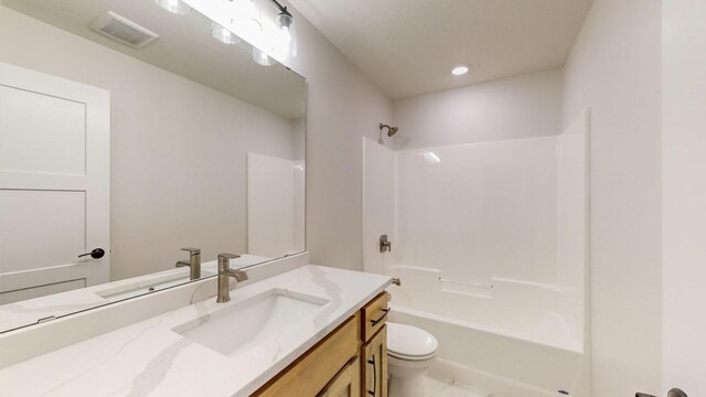1701 20th Ave Circle NE, Kasson, MN 55944 - full bath featuring toilet, vanity, bathing tub / shower combination, and recessed lighting