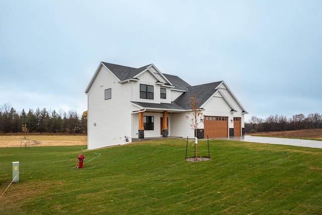 modern farmhouse with a garage and a front yard