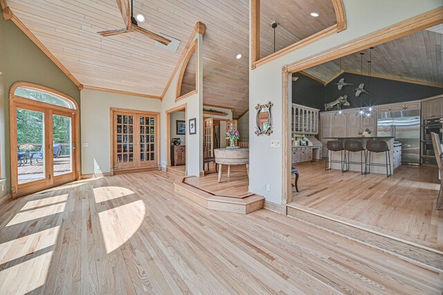 living room featuring wood ceiling, high vaulted ceiling, and light wood-type flooring