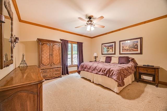 carpeted bedroom featuring ceiling fan and ornamental molding