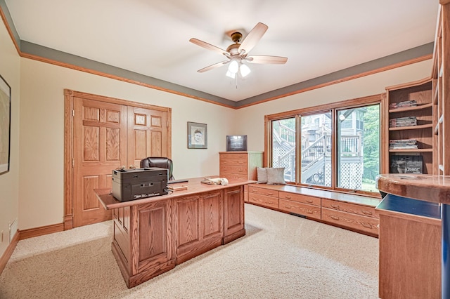 office area featuring light carpet and ceiling fan