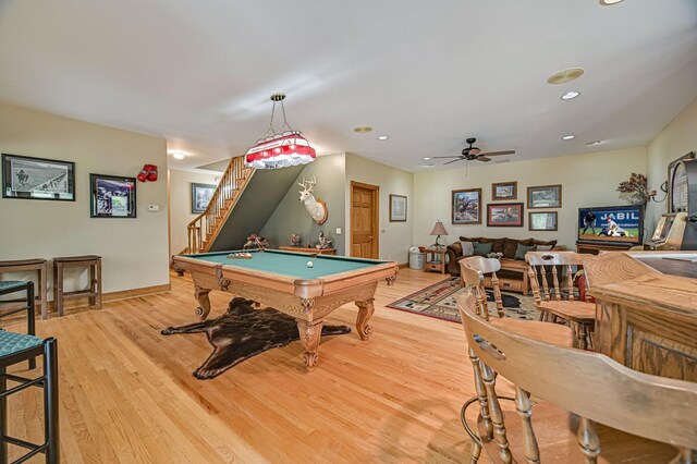 playroom featuring ceiling fan, pool table, and light wood-type flooring