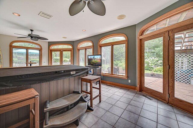 kitchen featuring ceiling fan and light tile patterned flooring