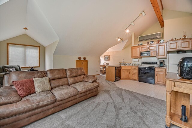 tiled living room with track lighting and lofted ceiling