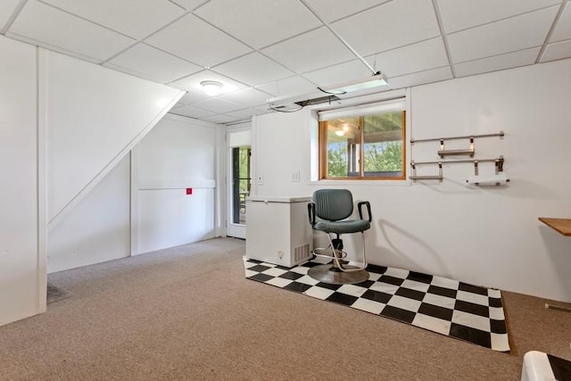 office with a paneled ceiling