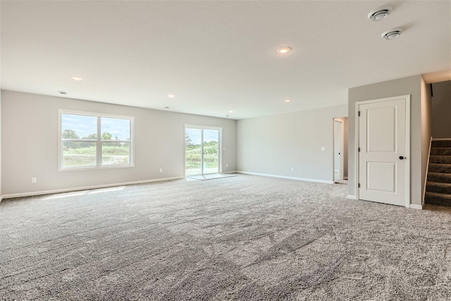 unfurnished room featuring carpet floors