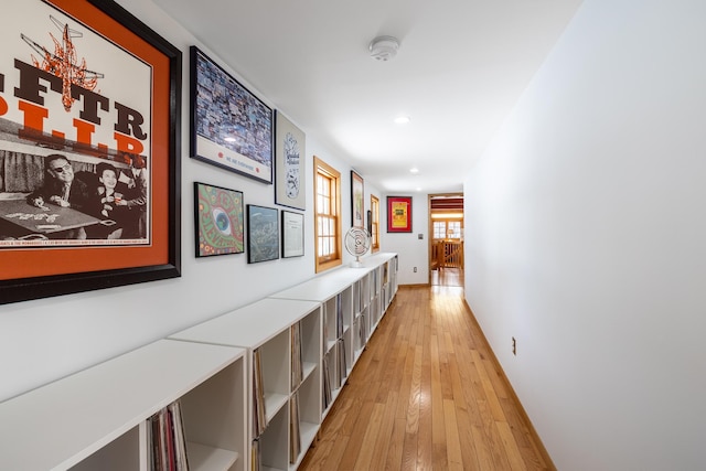 hallway featuring light wood-style floors