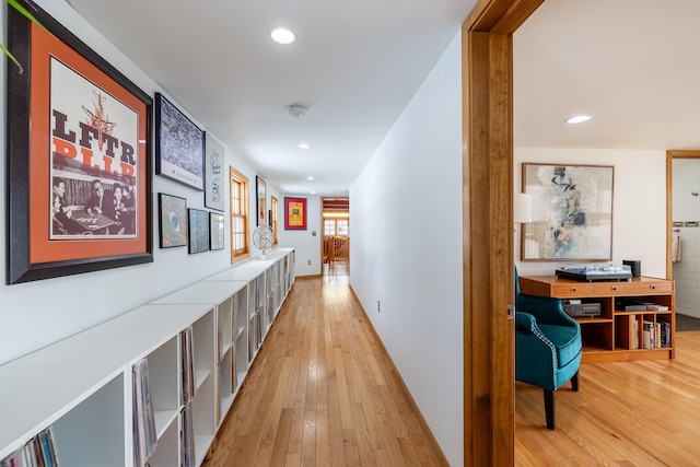 hall featuring recessed lighting and light wood finished floors