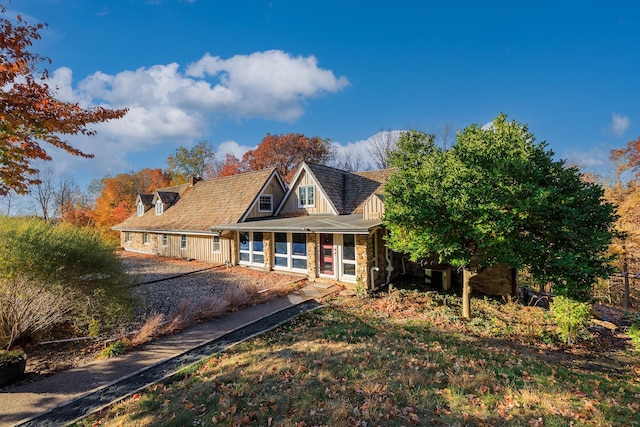 view of front of home with stone siding