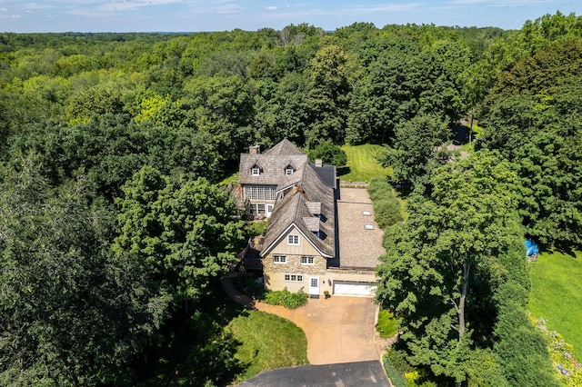 drone / aerial view with a view of trees