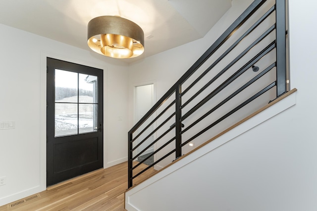 foyer entrance featuring light wood-type flooring