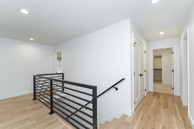 hallway with light wood-type flooring