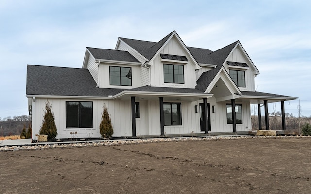 modern farmhouse style home featuring a porch