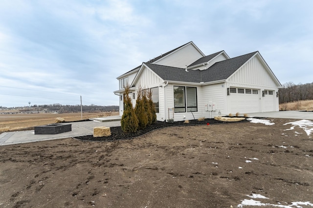 exterior space with a garage