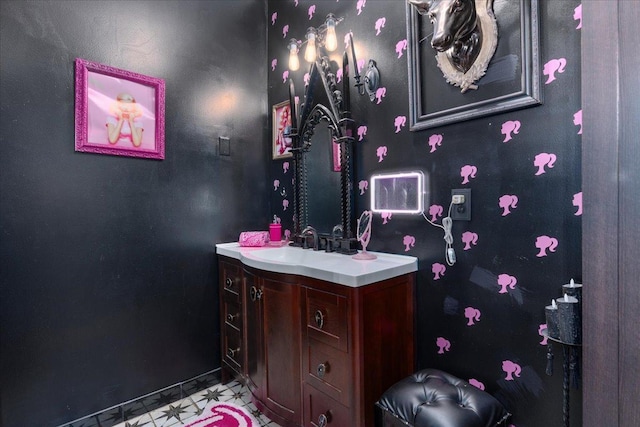 bathroom with tile patterned floors and vanity