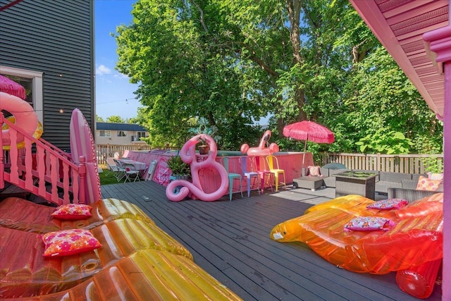 deck with an outdoor hangout area