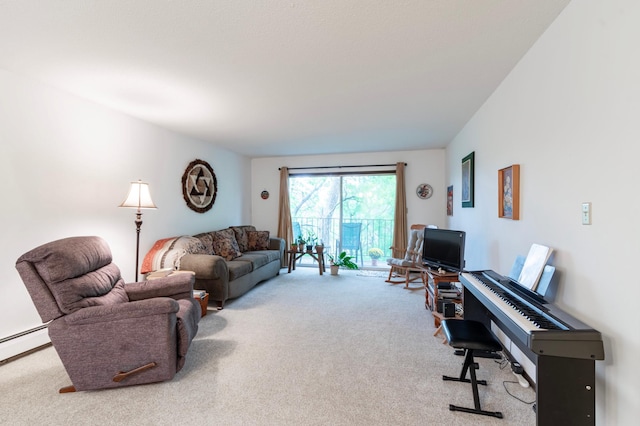 living room with baseboard heating and carpet floors