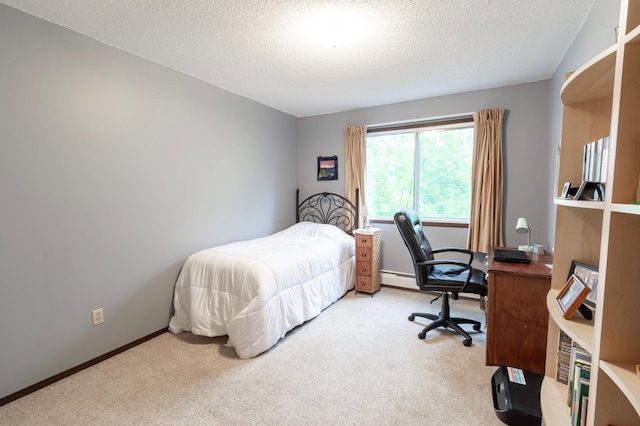 bedroom with carpet, a baseboard radiator, and a textured ceiling