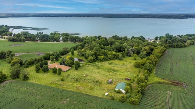 birds eye view of property with a water view and a rural view