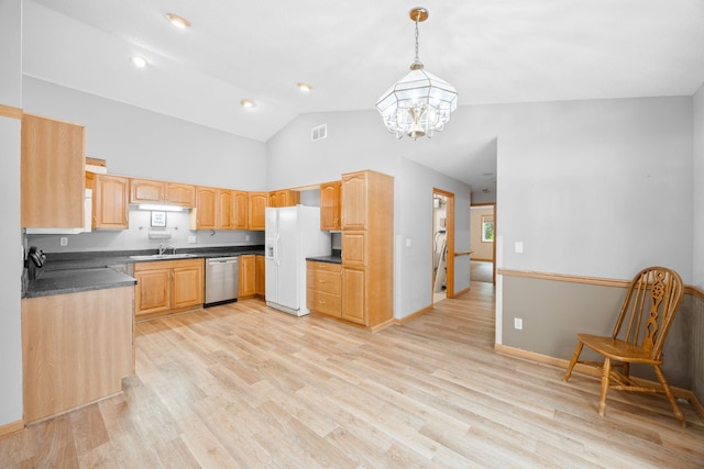 kitchen with lofted ceiling, hanging light fixtures, dishwasher, sink, and light hardwood / wood-style floors