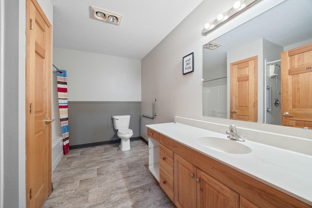69531-1 213th St, Darwin, MN 55324 - full bathroom featuring shower / bath combination with curtain, toilet, wood finished floors, baseboards, and vanity