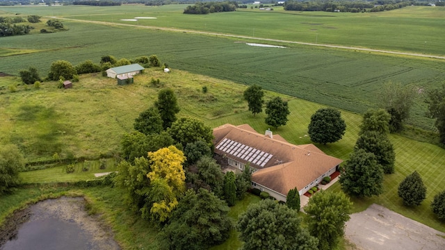 birds eye view of property with a rural view