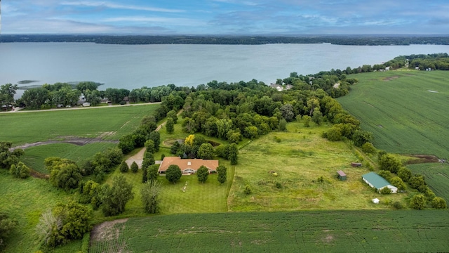 drone / aerial view featuring a rural view and a water view