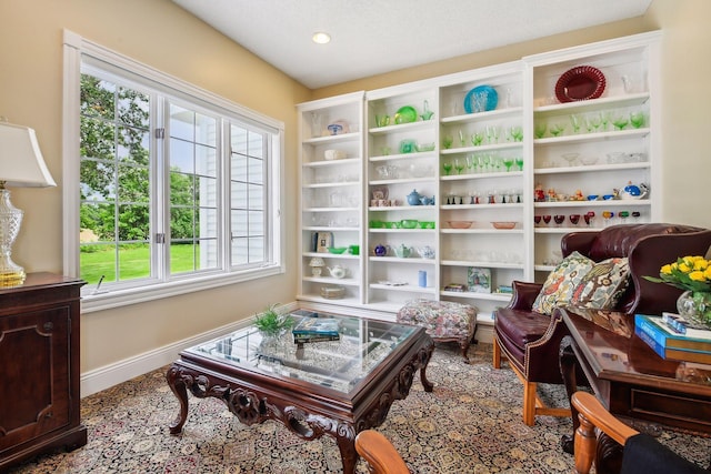 sitting room featuring baseboards