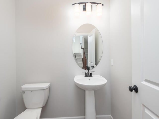 bathroom featuring toilet