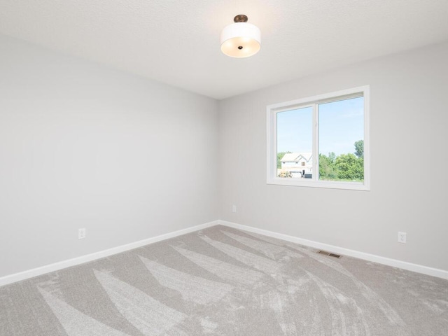 empty room with carpet floors