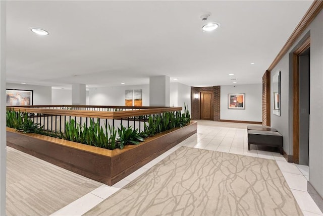 hallway with light tile patterned flooring