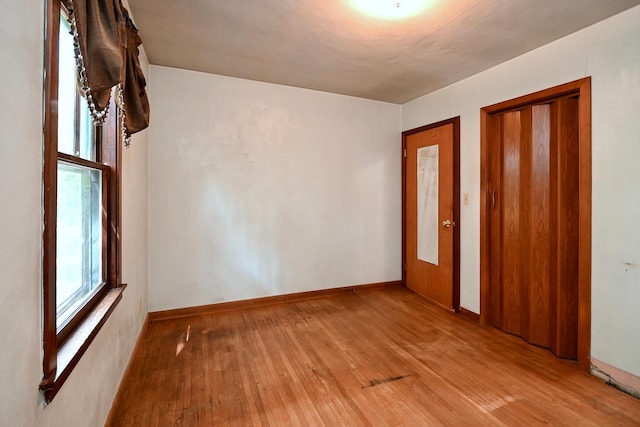 unfurnished bedroom featuring light hardwood / wood-style floors