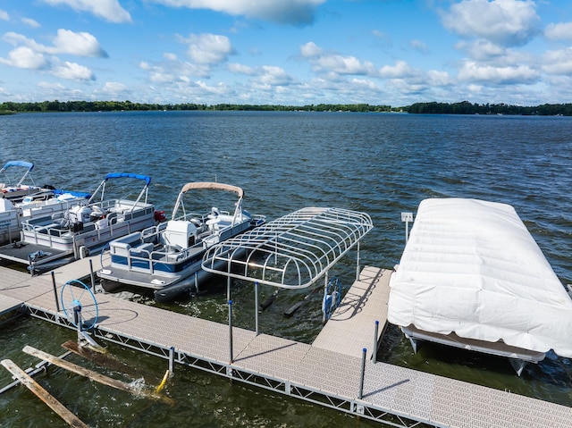 dock area featuring a water view