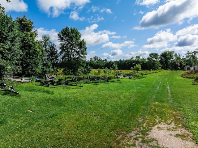 view of yard with a rural view