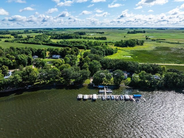 birds eye view of property with a rural view and a water view