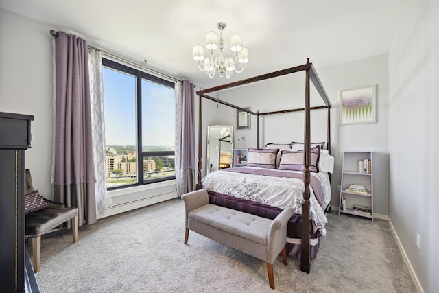 bedroom featuring light colored carpet and an inviting chandelier