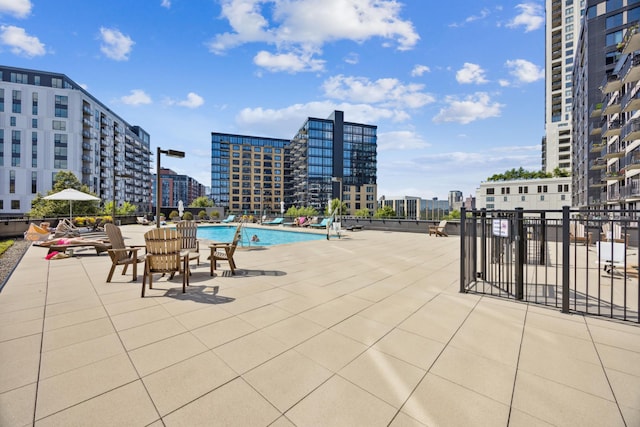 view of patio / terrace featuring a community pool