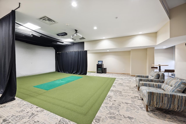 recreation room with golf simulator and light carpet