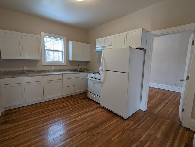 kitchen with a sink, under cabinet range hood, white cabinetry, white appliances, and dark wood-style flooring