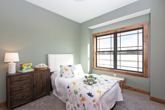 bedroom with light colored carpet