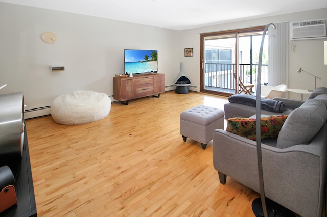 living room with baseboard heating, light hardwood / wood-style floors, and a wall mounted AC