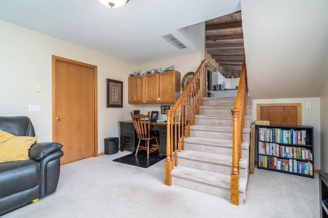 stairway with light carpet