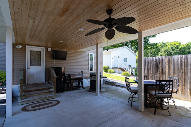 view of patio / terrace featuring a grill and ceiling fan