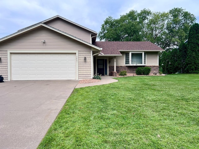 single story home with a front yard and a garage