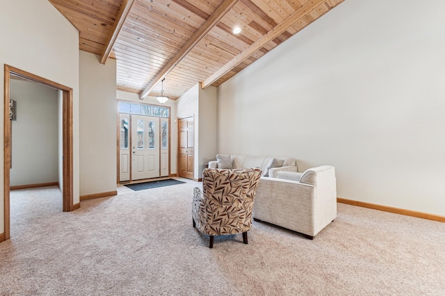 living area featuring beamed ceiling, high vaulted ceiling, carpet floors, and wood ceiling